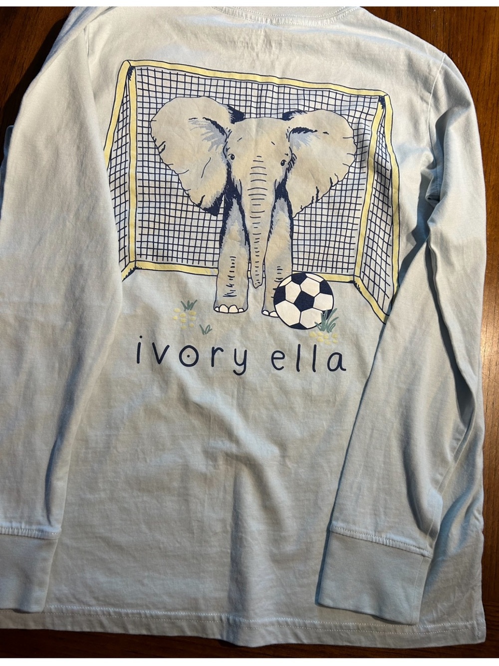 ivory ella Light Blue Long Sleeved Soccer Tee with Navy & Cream Elephant Graphic